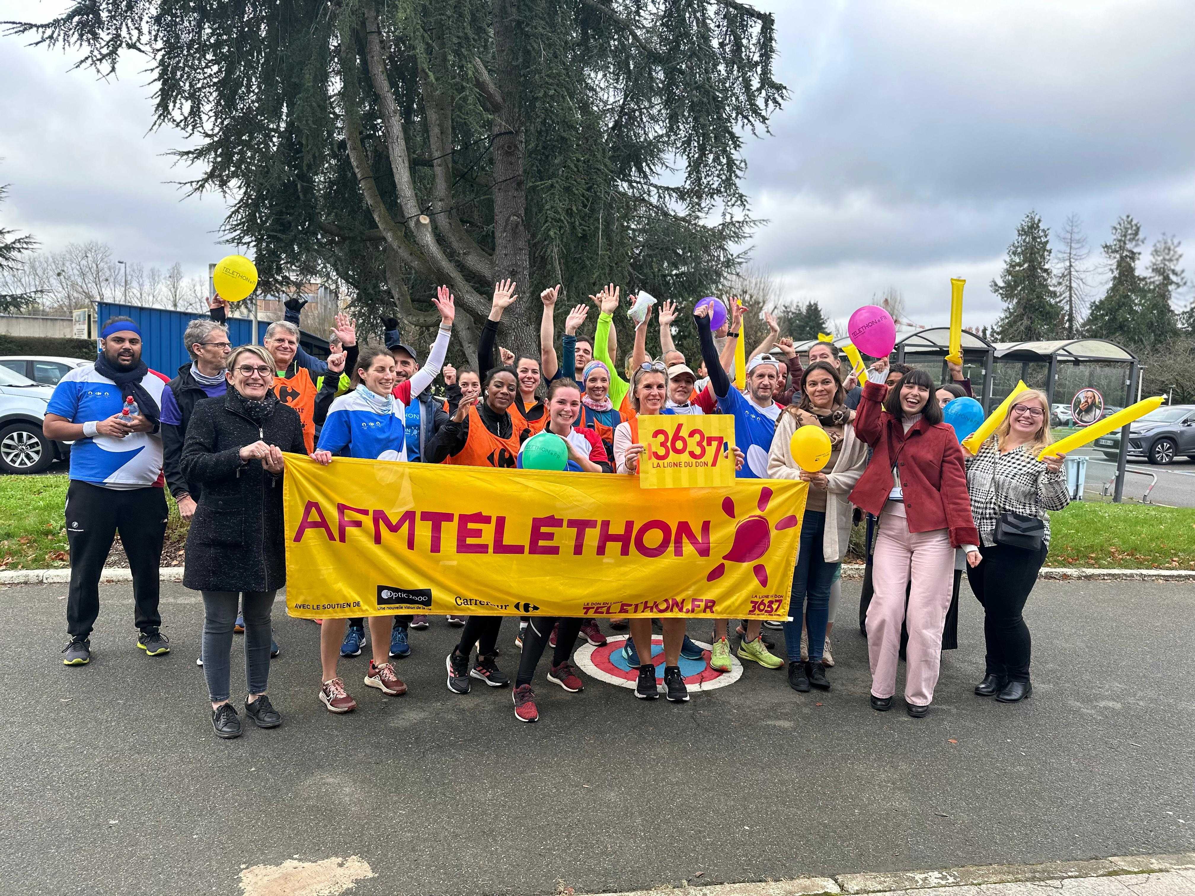 Arrivée des coureurs à Evry - collaborateurs Carrefour et de l'AFM-Téléthon